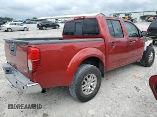 2015 Nissan Frontier SV with VIN 1N6AD0ER1FN708055, listed as a Copart auction lot 61051315 with 139,647 mi miles and Salvage title. Bid and sale history available at DreamBid. Image 3.