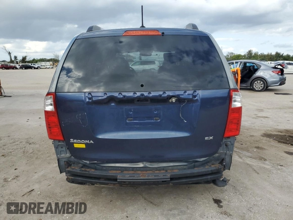 2009 Kia Sedona EX with VIN KNDMB233396299667, listed as a Copart auction lot 80186774 with 197,328 mi miles and Salvage Title. Bid and sale history available at carsss.com. Image 6.