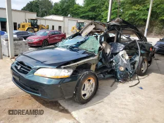 1998 Honda Accord EX with VIN 1HGCG5656WA085617, listed as a Copart auction lot 57094345 with Not provided miles and Non repairable. Bid and sale history available at DreamBid. Image 1.