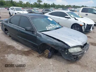 1997 Honda Accord EX z VIN 1HGCD5562VA814472, wystawiony jako IAAI lot #42375929 z przebiegiem 287 389 mil mil oraz . Historia ofert i sprzedaży dostępna na DreamBid. Obrazek 1.