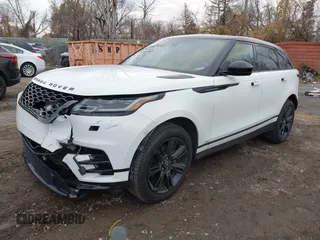2020 Land Rover Range Rover Velar R-Dynamic S z VIN SALYK2EX7LA275015, wystawiony jako IAAI lot #40964904 z przebiegiem 51 103 mil mil oraz . Historia ofert i sprzedaży dostępna na DreamBid. Obrazek 2.