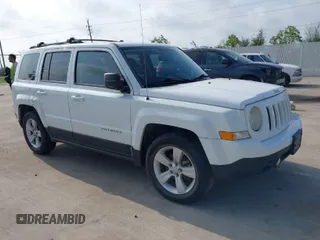2014 Jeep Patriot Latitude with VIN 1C4NJPFA3ED618523, listed as a IAAI auction lot 41750625 with Not Provided miles and . Bid and sale history available at carsss.com. Image 1.