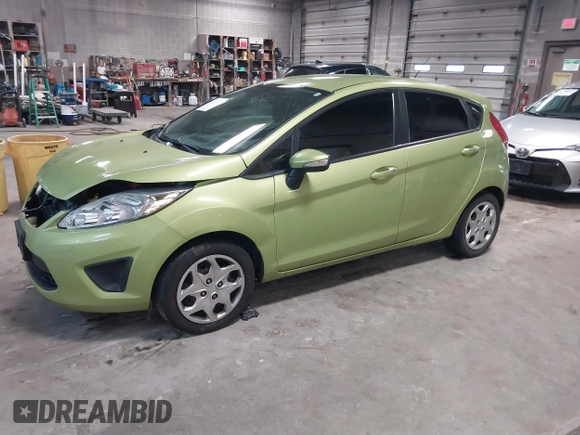 2013 Ford Fiesta SE with VIN 3FADP4EJ9DM131913, listed as a IAAI auction lot 41677333 with 54,673 mi miles. Bid and sale history available at carsss.com. Image 17.