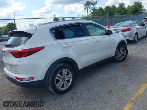 2017 Kia Sportage LX with VIN KNDPM3ACXH7298783, listed as a IAAI auction lot 40378233 with 77,423 mi miles. Bid and sale history available at carsss.com. Image 4.