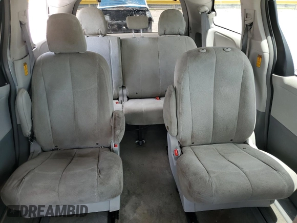 2014 Toyota Sienna L with VIN 5TDZK3DC3ES430634, listed as a Copart auction lot 60715375 with 122,621 mi miles and Salvage title. Bid and sale history available at DreamBid. Image 10.