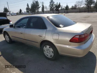 2000 Honda Accord LX z VIN 1HGCG1643YA089899, wystawiony jako Copart lot #54937555 z przebiegiem 196 596 mil mil oraz Szkoda całkowita • Salvage title. Historia ofert i sprzedaży dostępna na DreamBid. Obrazek 2.