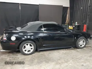 2000 Ford Mustang with VIN 1FAFP4448YF214730, listed as a IAAI auction lot 41467473 with 114,910 mi miles. Bid and sale history available at carsss.com. Image 13.