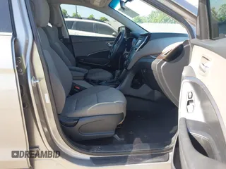 2017 Hyundai Santa Fe 2.4L z VIN 5XYZTDLB7HG444033, wystawiony jako IAAI lot #42263907 z przebiegiem 107 454 mil mil oraz . Historia ofert i sprzedaży dostępna na DreamBid. Obrazek 5.