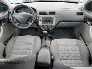 2007 Ford Focus S z VIN 1FAFP34N47W164846, wystawiony jako Copart lot #55587185 z przebiegiem 41 172 mil mil oraz Szkoda całkowita • Salvage title. Historia ofert i sprzedaży dostępna na DreamBid. Obrazek 8.
