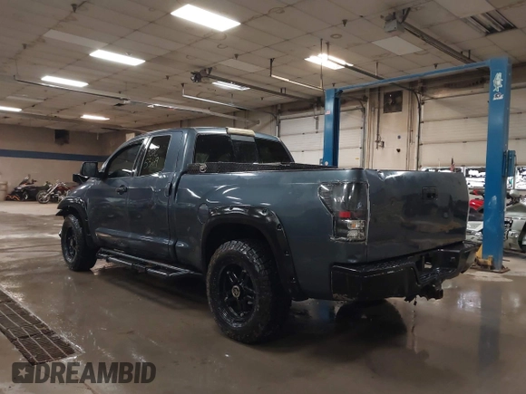 2009 Toyota Tundra 4WD Truck with VIN 5TFBW54199X091510, listed as a IAAI auction lot 42025369 with 234,784 mi miles. Bid and sale history available at carsss.com. Image 3.