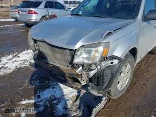 2010 Mercury Mariner with VIN 4M2CN8B72AKJ30465, listed as a IAAI auction lot 41554592 with 110,973 mi miles. Bid and sale history available at carsss.com. Image 6.