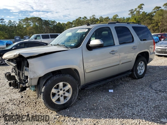 2009 GMC Yukon SLT w/4SA with VIN 1GKFC33J99R148006, listed as a Copart auction lot 88668535 with 145,088 mi miles and Salvage Title. Bid and sale history available at carsss.com. Image 1.