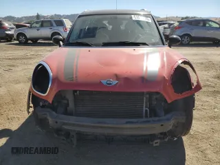 2014 MINI Countryman with VIN WMWZB3C5XEWR42035, listed as a Copart auction lot 61846725 with 105,131 mi miles and Salvage title. Bid and sale history available at DreamBid. Image 5.