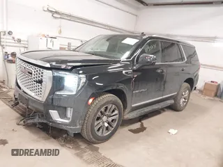 2021 GMC Yukon Denali with VIN 1GKS2DKL2MR432564, listed as a IAAI auction lot 41392475 with 44,045 mi miles. Bid and sale history available at carsss.com. Image 2.