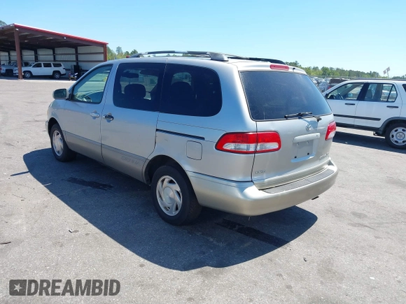 2001 Toyota Sienna LE with VIN 4T3ZF13CX1U372072, listed as a IAAI auction lot 41889291 with 228,959 mi miles. Bid and sale history available at carsss.com. Image 3.
