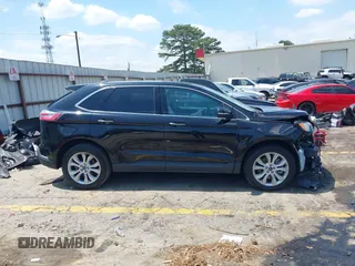 2021 Ford Edge Titanium z VIN 2FMPK3K96MBA16046, wystawiony jako IAAI lot #42137419 z przebiegiem 88 622 mil mil oraz . Historia ofert i sprzedaży dostępna na DreamBid. Obrazek 13.