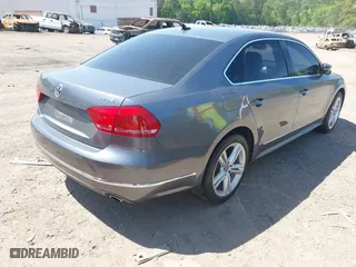 2013 Volkswagen Passat SEL Premium with VIN 1VWCM7A34DC055684, listed as a IAAI auction lot 42039636 with 167,746 mi miles. Bid and sale history available at carsss.com. Image 4.
