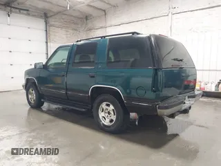 1996 Chevrolet Tahoe z VIN 1GNEK13R4TJ417000, wystawiony jako IAAI lot #41992121 z przebiegiem 166 215 mil mil oraz . Historia ofert i sprzedaży dostępna na DreamBid. Obrazek 3.