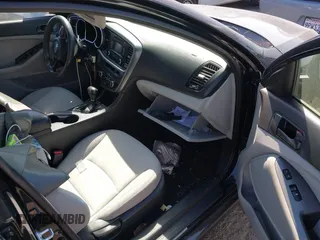 2015 Kia Optima LX with VIN 5XXGM4A79FG517083, listed as a IAAI auction lot 41805370 with 77,800 mi miles. Bid and sale history available at carsss.com. Image 5.