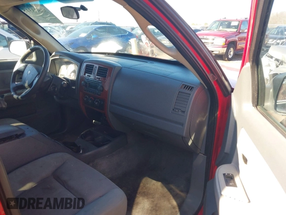 2005 Dodge Dakota SLT with VIN 1D7HW48N65S202948, listed as a IAAI auction lot 38573315 with 351,854 mi miles and . Bid and sale history available at DreamBid. Image 5.
