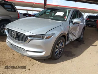 2017 Mazda CX-5 Grand Touring with VIN JM3KFADL3H0121772, listed as a IAAI auction lot 41935183 with 48,869 mi miles and . Bid and sale history available at carsss.com. Image 2.