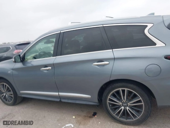 2016 Infiniti QX60 with VIN 5N1AL0MN0GC513738, listed as a IAAI auction lot 41907401 with 155,024 mi miles. Bid and sale history available at carsss.com. Image 14.