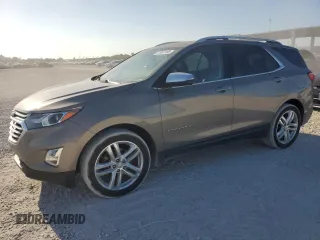 2019 Chevrolet Equinox Premier z VIN 3GNAXPEX7KS516518, wystawiony jako Copart lot #57937105 z przebiegiem 49 691 mil mil oraz Szkoda całkowita • Salvage title. Historia ofert i sprzedaży dostępna na DreamBid. Obrazek 1.