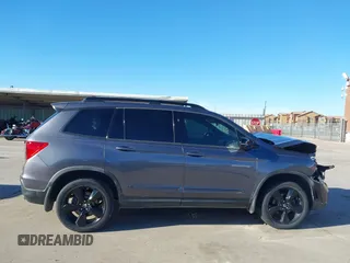 2019 Honda Passport Elite z VIN 5FNYF8H07KB015720, wystawiony jako IAAI lot #41221298 z przebiegiem 65 747 mil mil oraz . Historia ofert i sprzedaży dostępna na DreamBid. Obrazek 14.