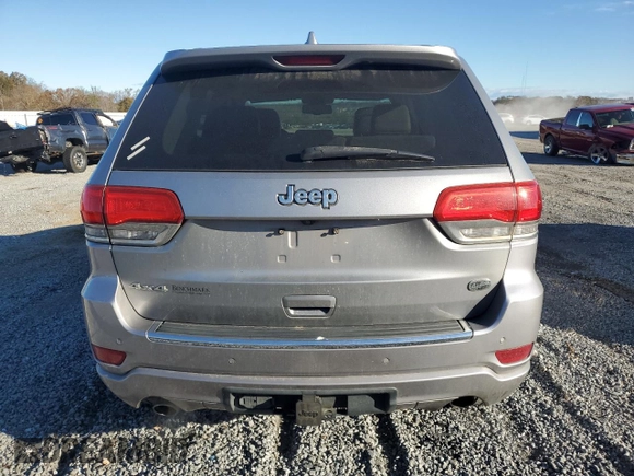2014 Jeep Grand Cherokee Overland with VIN 1C4RJFCG0EC226397, listed as a Copart auction lot 80295784 with 131,921 mi miles and Salvage Title. Bid and sale history available at DreamBid. Image 6.