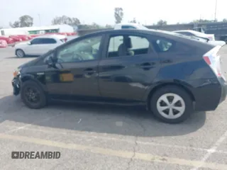 2014 Toyota Prius Four with VIN JTDKN3DU0E0376097, listed as a IAAI auction lot 41909796 with 122,973 mi miles. Bid and sale history available at carsss.com. Image 14.