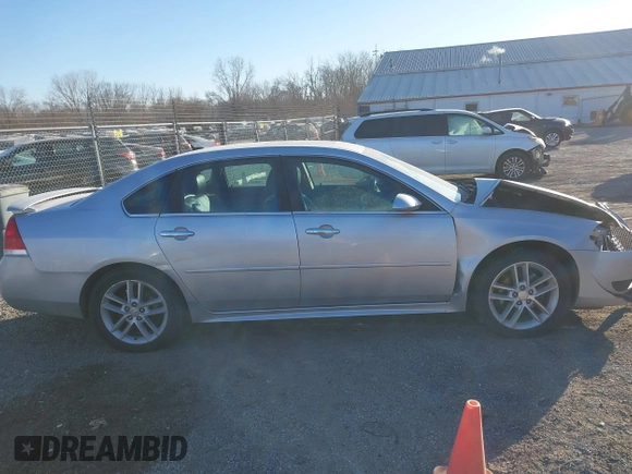 2013 Chevrolet Impala LTZ with VIN 2G1WC5E31D1190461, listed as a IAAI auction lot 41381242 with 205,833 mi miles and . Bid and sale history available at DreamBid. Image 13.