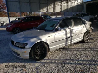 2003 BMW 3 Series 330i with VIN WBAEV534X3KM05095, listed as a Copart auction lot 82410974 with 220,644 mi miles and Salvage Title. Bid and sale history available at carsss.com. Image 1.