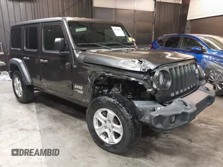 2018 Jeep Wrangler Unlimited Sport S with VIN 1C4HJXDG5JW126496, listed as a IAAI auction lot 42390584 with 163,476 mi miles and . Bid and sale history available at DreamBid. Image 1.
