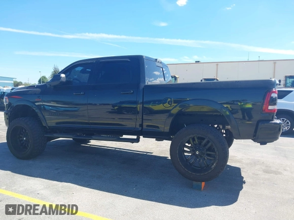 2019 Ram 2500 Laramie with VIN 3C6UR5FLXKG710325, listed as a IAAI auction lot 41853777 with 104,286 mi miles. Bid and sale history available at carsss.com. Image 14.