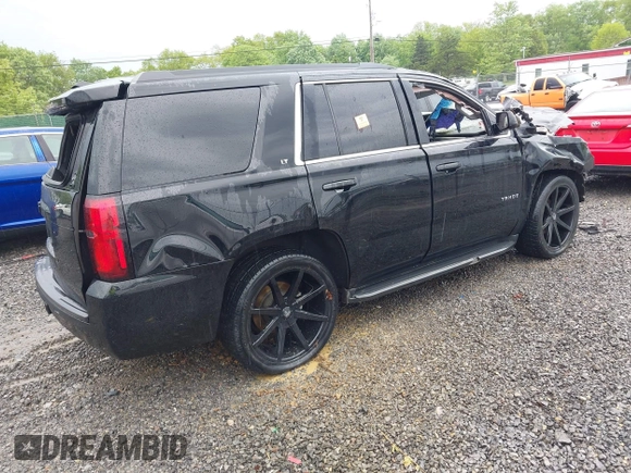 2018 Chevrolet Tahoe LT with VIN 1GNSCBKC2JR359681, listed as a IAAI auction lot 42287525 with 144,568 mi miles and . Bid and sale history available at DreamBid. Image 4.
