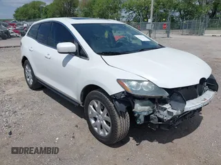 2007 Mazda CX-7 Sport z VIN JM3ER293170143125, wystawiony jako IAAI lot #42293211 z przebiegiem 163 434 mil mil oraz . Historia ofert i sprzedaży dostępna na DreamBid. Obrazek 1.
