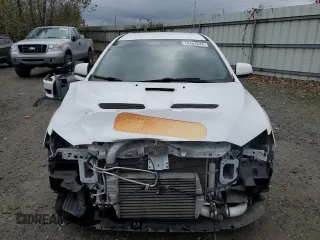 2010 Mitsubishi Lancer Evolution SE with VIN JA32W6FV3AU034052, listed as a Copart auction lot 72463644 with 44,517 mi miles and Salvage Title. Bid and sale history available at carsss.com. Image 5.
