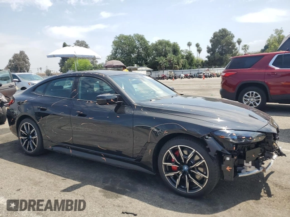 2024 BMW i4 M50 with VIN WBY33AW09RFS37404, listed as a Copart auction lot 51594984 with 776 mi miles and Salvage Title. Bid and sale history available at carsss.com. Image 4.