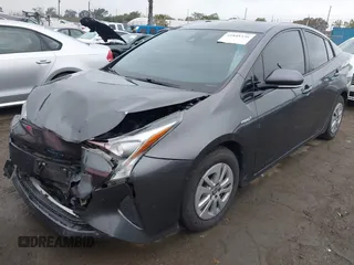 2018 Toyota Prius Two with VIN JTDKBRFUXJ3591956, listed as a IAAI auction lot 41848336 with 62,560 mi miles and . Bid and sale history available at DreamBid. Image 2.