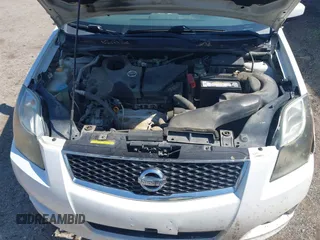 2012 Nissan Sentra SE-R z VIN 3N1BB6AP2CL670385, wystawiony jako IAAI lot #42431771 z przebiegiem 186 513 mil mil oraz . Historia ofert i sprzedaży dostępna na DreamBid. Obrazek 10.