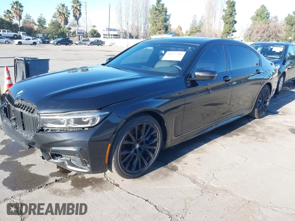 2022 BMW 7 Series 740i with VIN WBA7T2C02NCJ33925, listed as a IAAI auction lot 41377788 with 143,684 mi miles and . Bid and sale history available at carsss.com. Image 17.