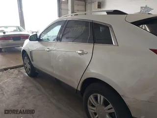 2014 Cadillac SRX Luxury Collection with VIN 3GYFNEE35ES681424, listed as a IAAI auction lot 41854969 with 135,163 mi miles. Bid and sale history available at carsss.com. Image 6.