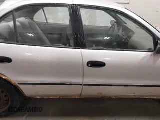 1997 Geo Prizm z VIN 1Y1SK526XVZ406366, wystawiony jako IAAI lot #41409191 z przebiegiem 259 489 mil mil oraz . Historia ofert i sprzedaży dostępna na DreamBid. Obrazek 13.
