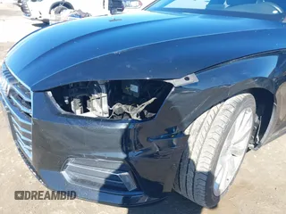 2018 Audi A5 Sportback Premium z VIN WAUANCF53JA009200, wystawiony jako IAAI lot #41725501 z przebiegiem 107 076 mil mil oraz . Historia ofert i sprzedaży dostępna na DreamBid. Obrazek 6.