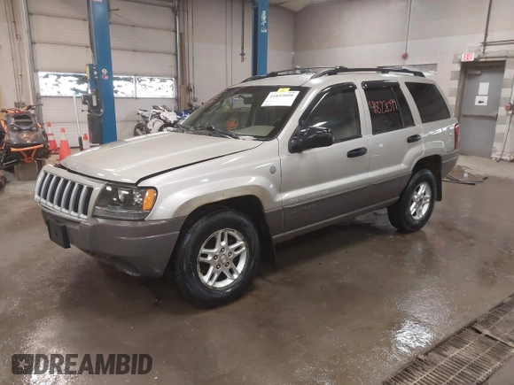2004 Jeep Grand Cherokee Laredo with VIN 1J4GW48S44C321869, listed as a IAAI auction lot 41822099 with 181,663 mi miles. Bid and sale history available at carsss.com. Image 17.