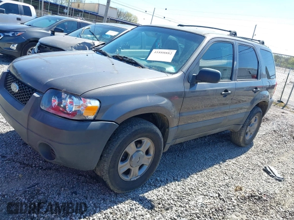2005 Ford Escape XLS Value with VIN 1FMYU02Z95KC05634, listed as a IAAI auction lot 41888882 with 213,098 mi miles. Bid and sale history available at carsss.com. Image 2.