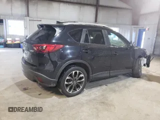 2016 Mazda CX-5 Grand Touring with VIN JM3KE4DY6G0655802, listed as a Copart auction lot 43820475 with 76,639 mi miles and Salvage Title. Bid and sale history available at carsss.com. Image 3.
