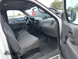 1999 Ford F-150 with VIN 1FTRF17W4XNC25668, listed as a IAAI auction lot 42731954 with 189,437 mi miles and . Bid and sale history available at DreamBid. Image 5.