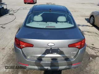2013 Kia Optima EX z VIN 5XXGN4A73DG228548, wystawiony jako Copart lot #62209395 z przebiegiem 142 692 mil mil oraz Szkoda całkowita • Salvage title. Historia ofert i sprzedaży dostępna na DreamBid. Obrazek 6.