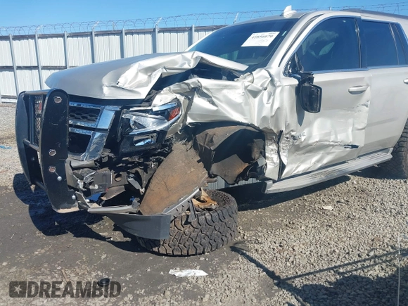 2015 Chevrolet Tahoe LT with VIN 1GNSCBKC8FR646756, listed as a IAAI auction lot 41856070 with 138,495 mi miles and . Bid and sale history available at DreamBid. Image 6.